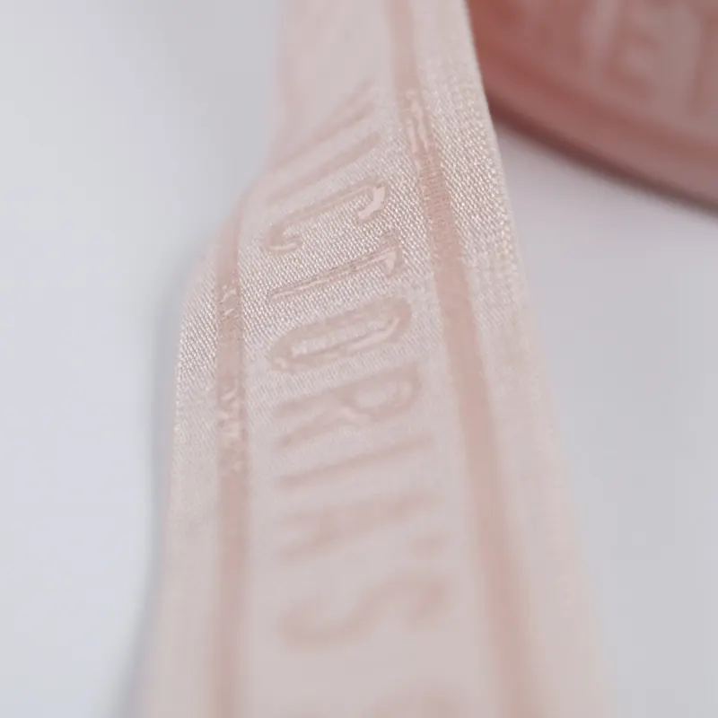 Roll of pink transparent silicone elastic band