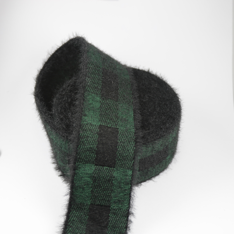 Faux mink velvet plaid elastic band folded over, showing the green and black check face and the dark fuzzy reverse side