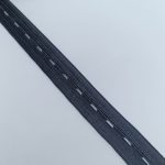 Close view of latex and polyester elastic tape for adjustable garment waistbands