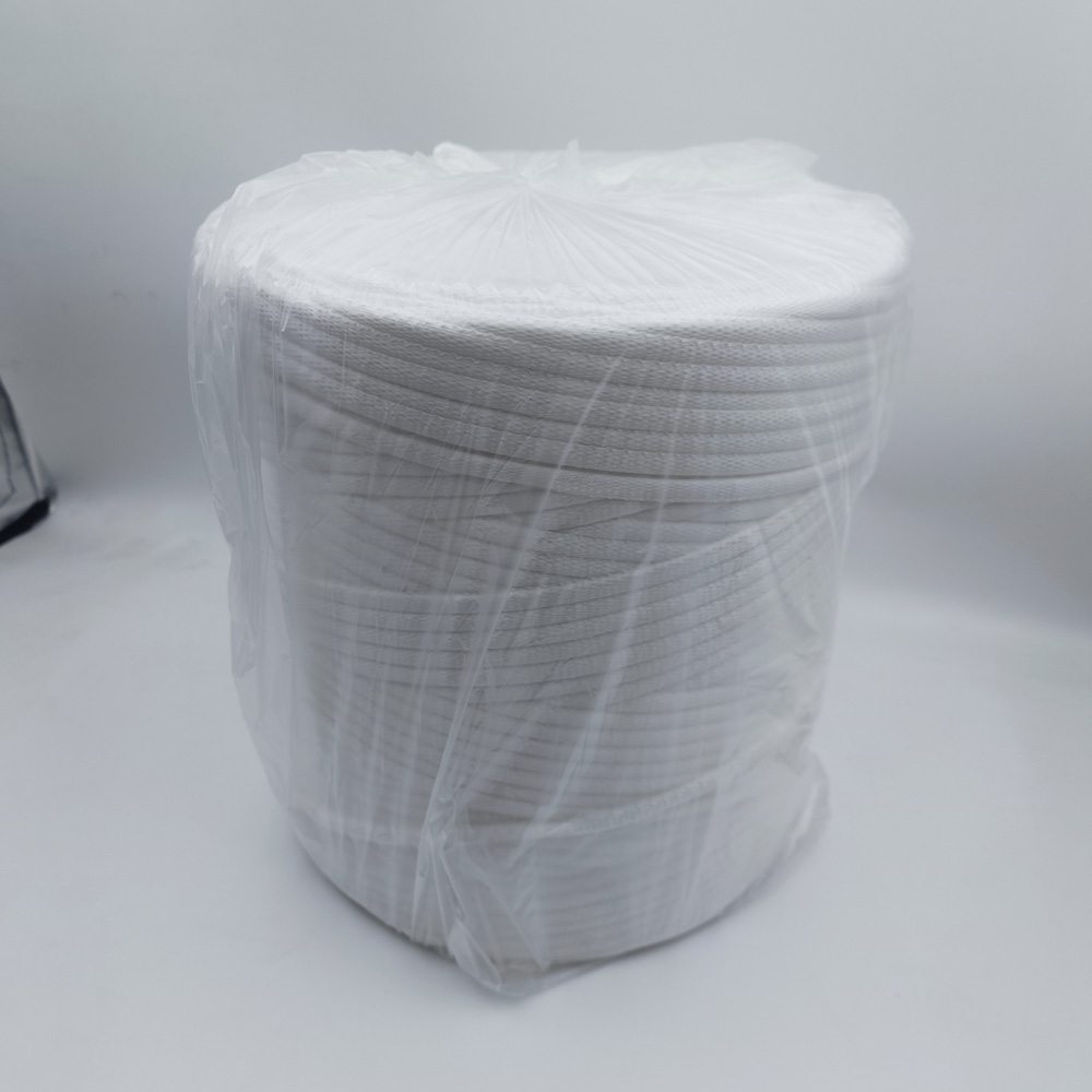 White ton bag leak-proof sealing strip coiled in a roll and wrapped in clear plastic film, shown on a plain light background