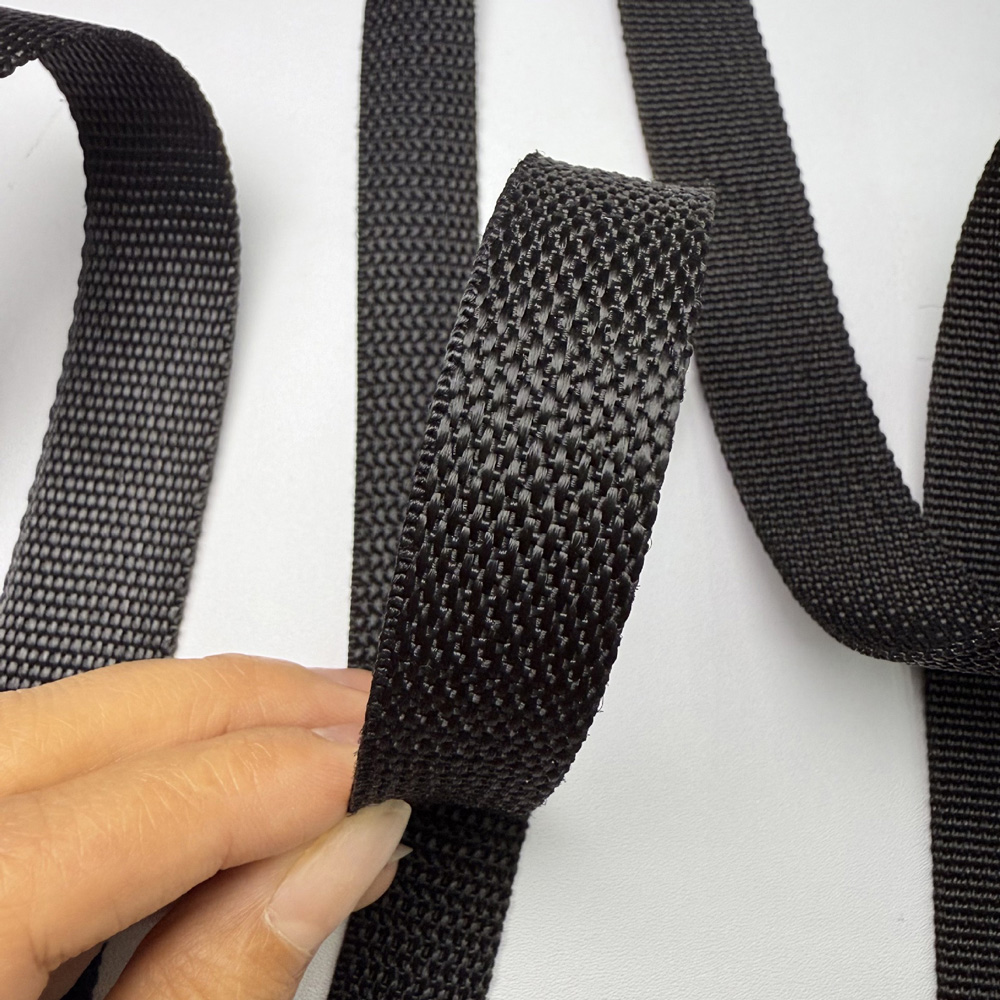 Beaded pattern black polypropylene webbing close-up